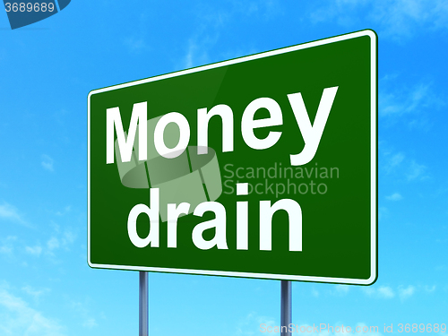 Image of Banking concept: Money Drain on road sign background