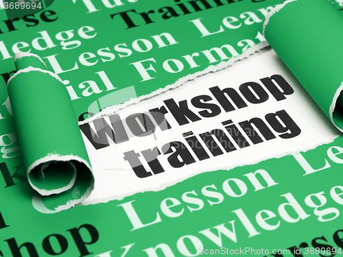 Image of Education concept: black text Workshop Training under the piece of  torn paper
