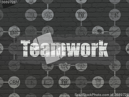 Image of Business concept: Teamwork on wall background