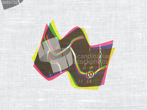 Image of Vacation concept: Map on fabric texture background