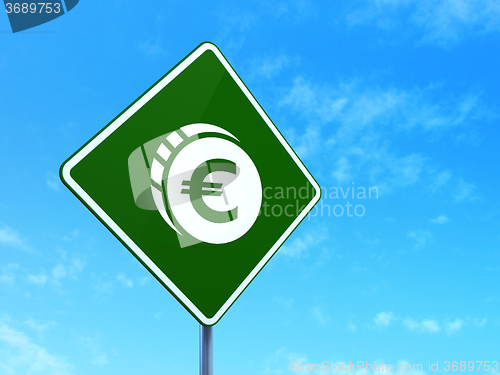 Image of Banking concept: Euro Coin on road sign background