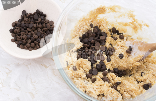 Image of Adding chocolate chips to cookie dough