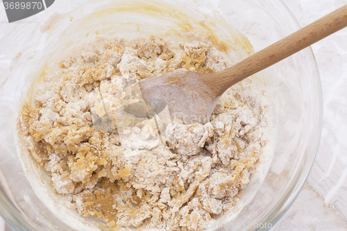 Image of Stirring dough to make peanut butter cookies