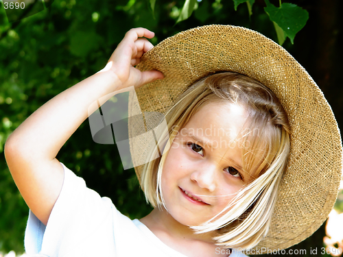 Image of girl with straw hat