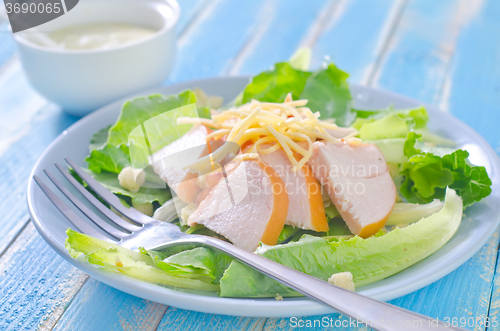 Image of fresh salad with chicken and cheese