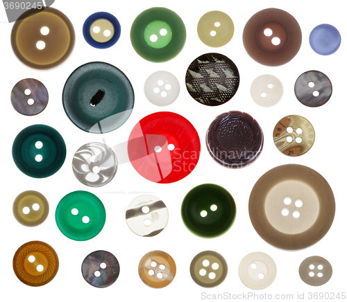 Image of collection of various sewing button on white background