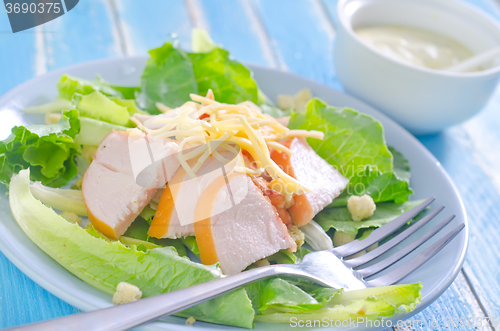 Image of fresh salad with chicken and cheese