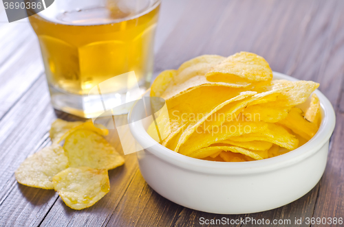 Image of chips from potato with beer