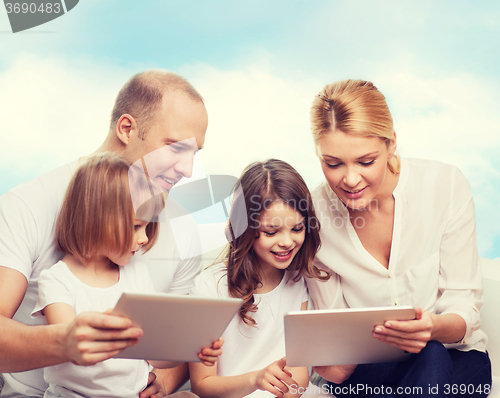 Image of happy family with tablet pc computers