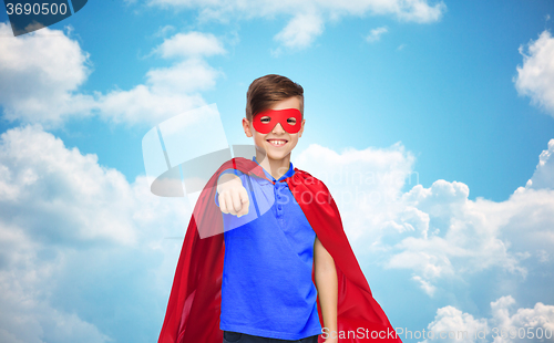 Image of happy boy in red superhero cape and mask