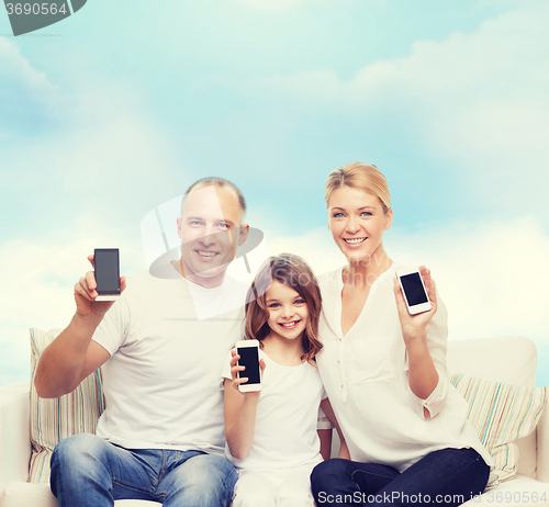 Image of happy family with smartphones