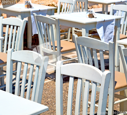 Image of table in santorini europe greece old restaurant chair and the su