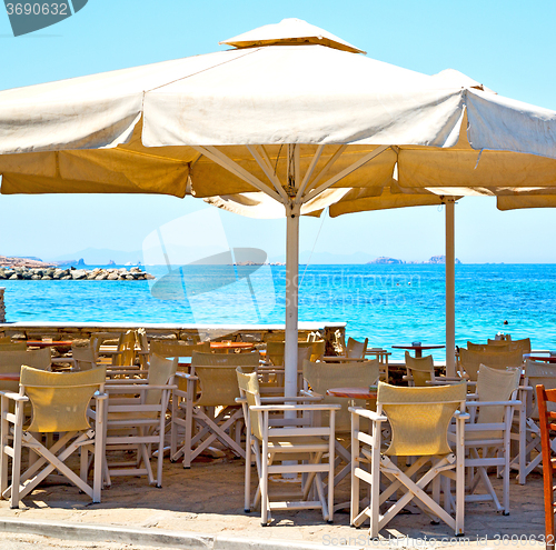 Image of table in santorini europe greece old restaurant chair and the su