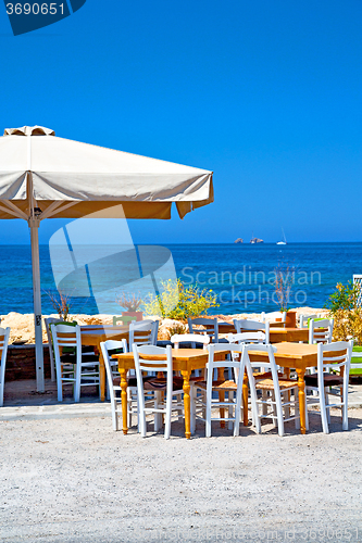 Image of table in santorini  greece old restaurant   summer