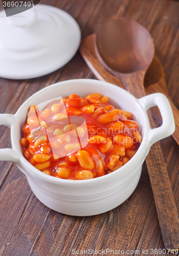 Image of white beans with tomato sauce