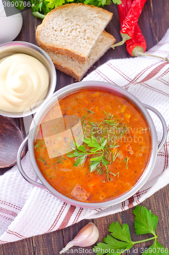 Image of soup with meat and rice