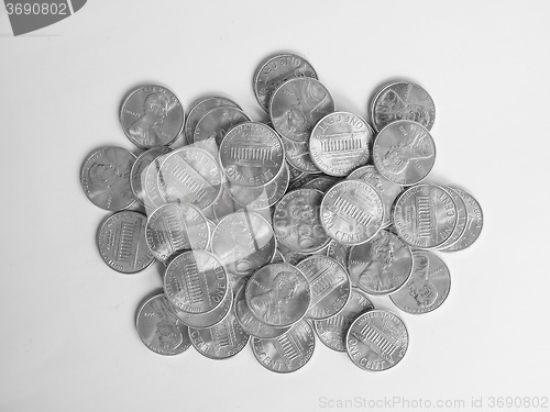 Image of Black and white Dollar coins 1 cent