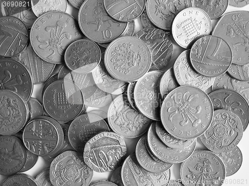 Image of Black and white Pound coins