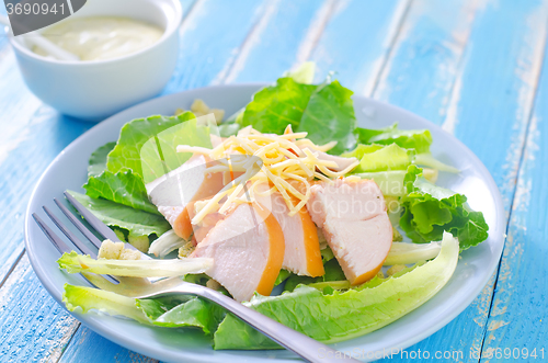 Image of fresh salad with chicken and cheese