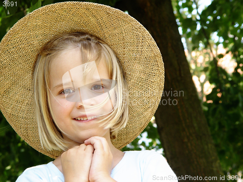 Image of girl with straw hat