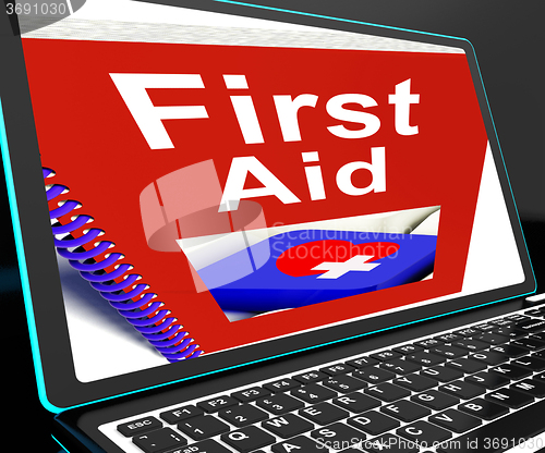 Image of First Aid On Laptop Shows Medical Assistance