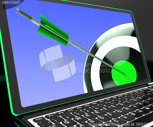 Image of Dartboard On Laptop Showing Precise Aiming