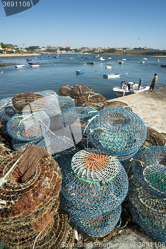 Image of EUROPE PORTUGAL PORTO BEACH COAST ATLANTIC FISHING