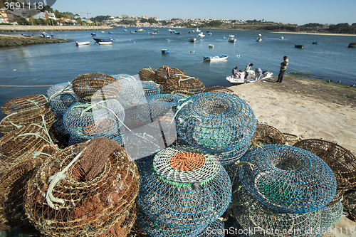 Image of EUROPE PORTUGAL PORTO BEACH COAST ATLANTIC FISHING