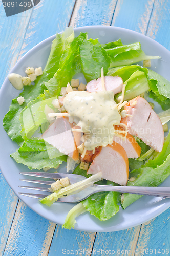 Image of fresh salad with chicken and cheese