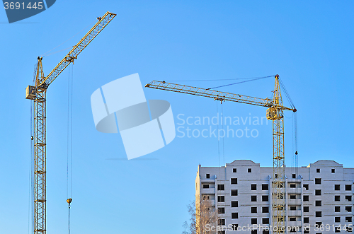 Image of Cranes and building construction 