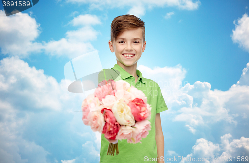 Image of happy boy holding flower bunch