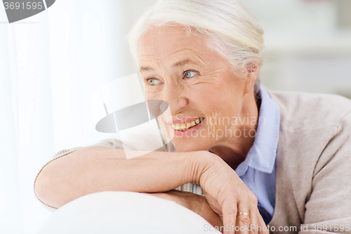 Image of happy senior woman face at home