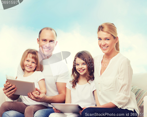 Image of happy family with tablet pc computers