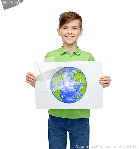 Image of happy boy holding drawing or picture of earth