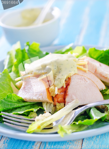 Image of fresh salad with chicken and cheese