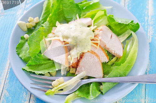 Image of fresh salad with chicken and cheese