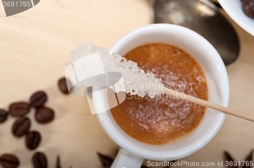 Image of espresso coffee with sugar and spice