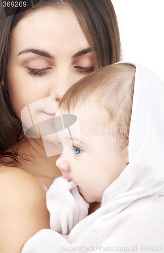 Image of safe in mother hands #2