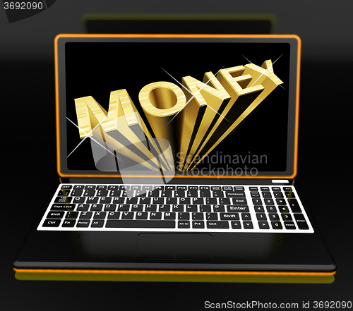 Image of Money On Laptop Showing Earnings