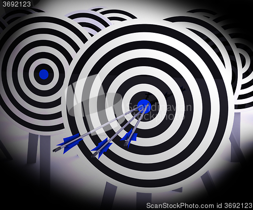 Image of Triple Target Shows Focused Successful Aim