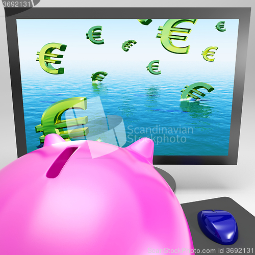 Image of Euro Symbols Drowning On Monitor Shows European Depression