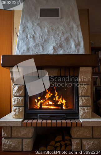 Image of close up of burning fireplace at home