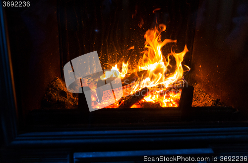 Image of close up of burning fireplace at home