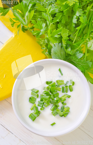 Image of sour cream with green onion