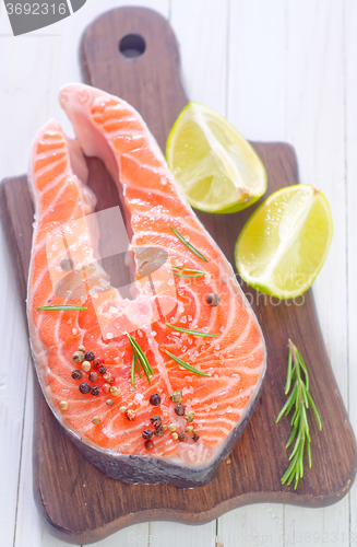 Image of raw salmon steak