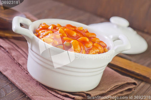 Image of white beans with tomato sauce