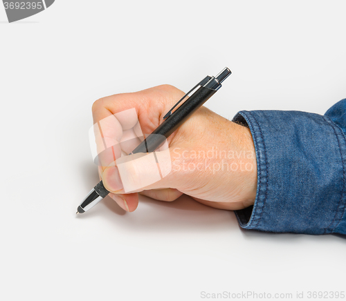 Image of hand with ball pen