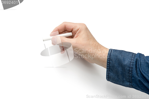 Image of hand with white crayon