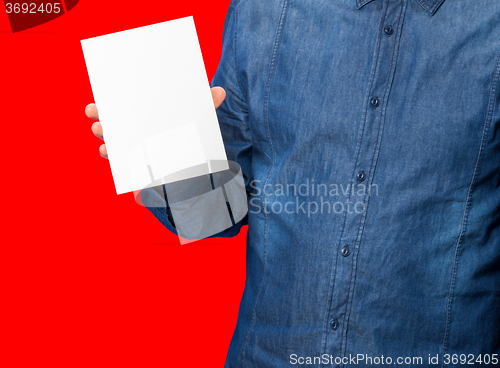 Image of man holding a sign