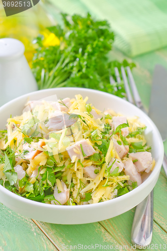 Image of salad with chicken and cheese